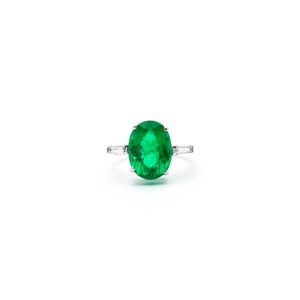 Emerald ring with tapered diamonds