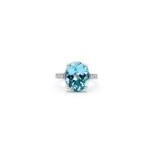 Oval cut aquamarine ring set with diamonds